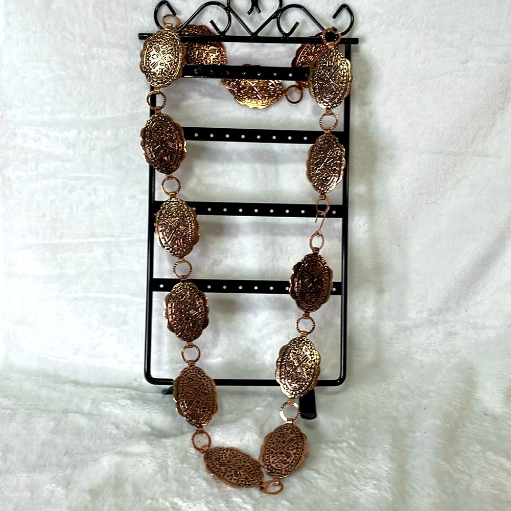 Copper color Concho belt or hat accessory. 36” long.